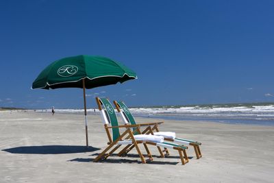 chairs and umbrella on the beach