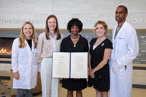 Rep. Valerie Foushee with Duke faculty and patients