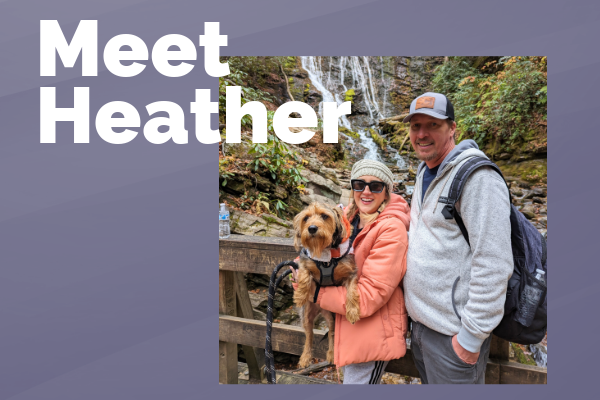 Heather Gensler and her husband and dog in front of a waterfall