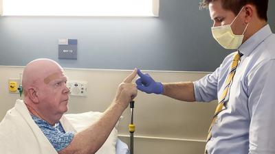 Dr. Harward with a patient after performing a HIFU procedure