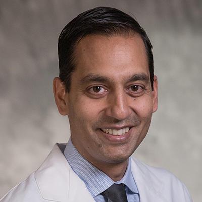 Headshot of Deb Bhowmick, Duke neurosurgeon
