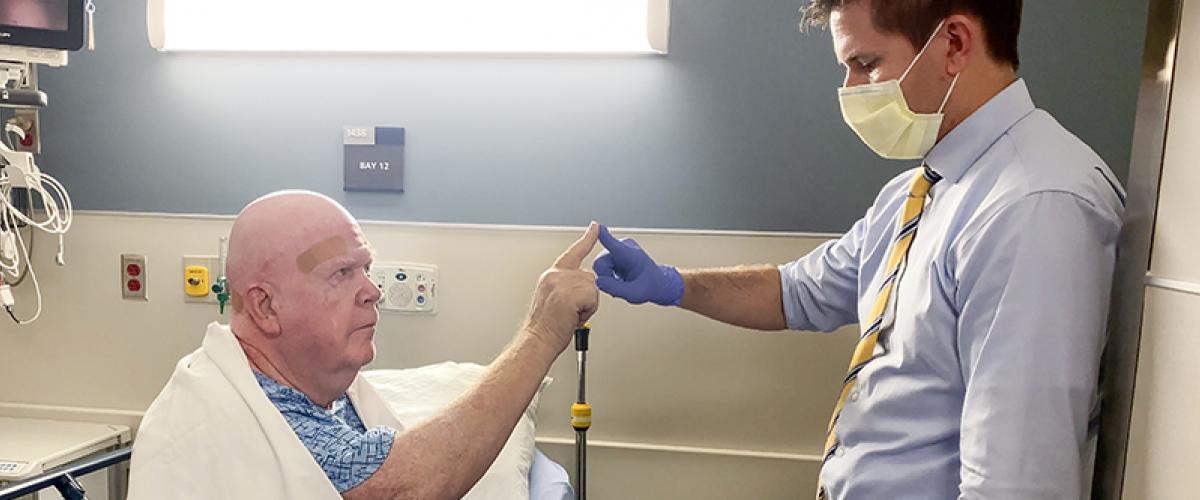 Dr. Harward with a patient after performing a HIFU procedure