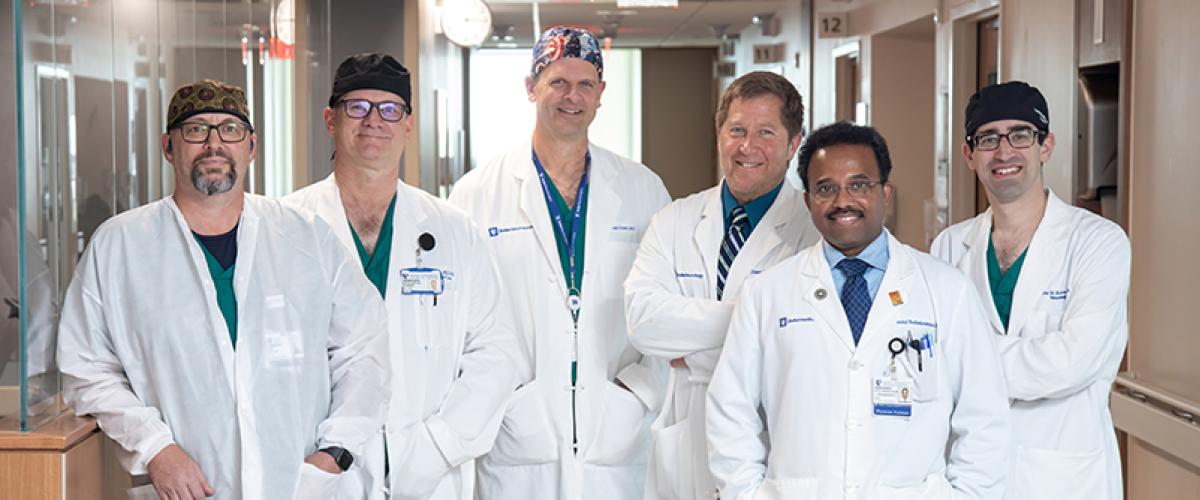 The trauma team, including neurosurgeons, neurologists, and APPs