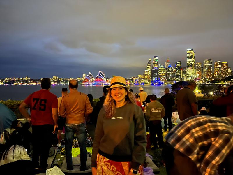 Heather Moffitt smiles in front of the opera house in Sydney, Australia before the New Year's fireworks.