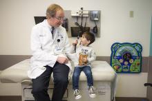 Dr. Fuchs with a patient