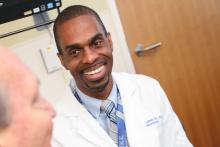 Dr. Goodwin with a patient
