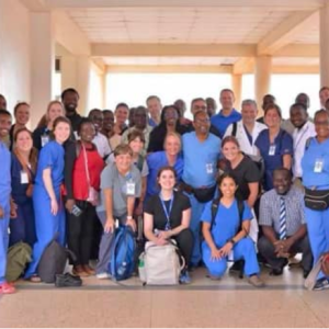 Duke volunteers and Ugandan care providers in a group shot